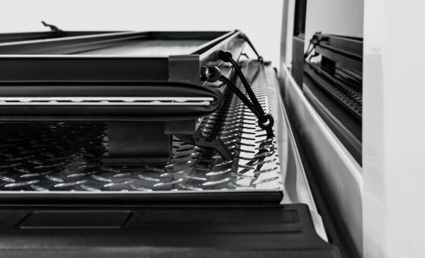 Access LOMAX 2022+ Rivian R1T 4ft 6in Bed (w/ OEM Tonneau Track) Folding Hard Cover - Black Urethane
